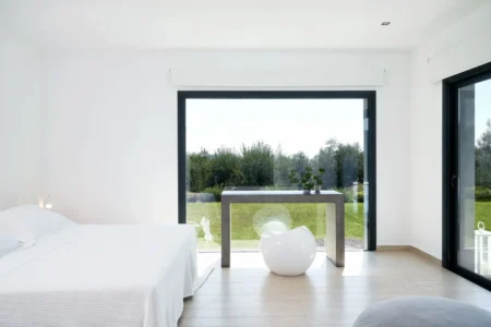 Alpha Homes Corfu Real Estate Viros Villa room with double bed