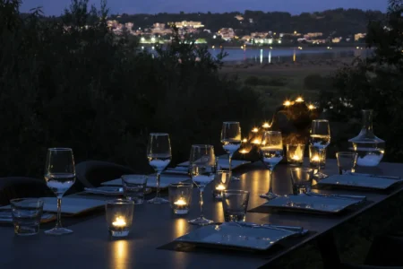 Alpha Homes Corfu Real Estate Viros Villa exterior dining table night time