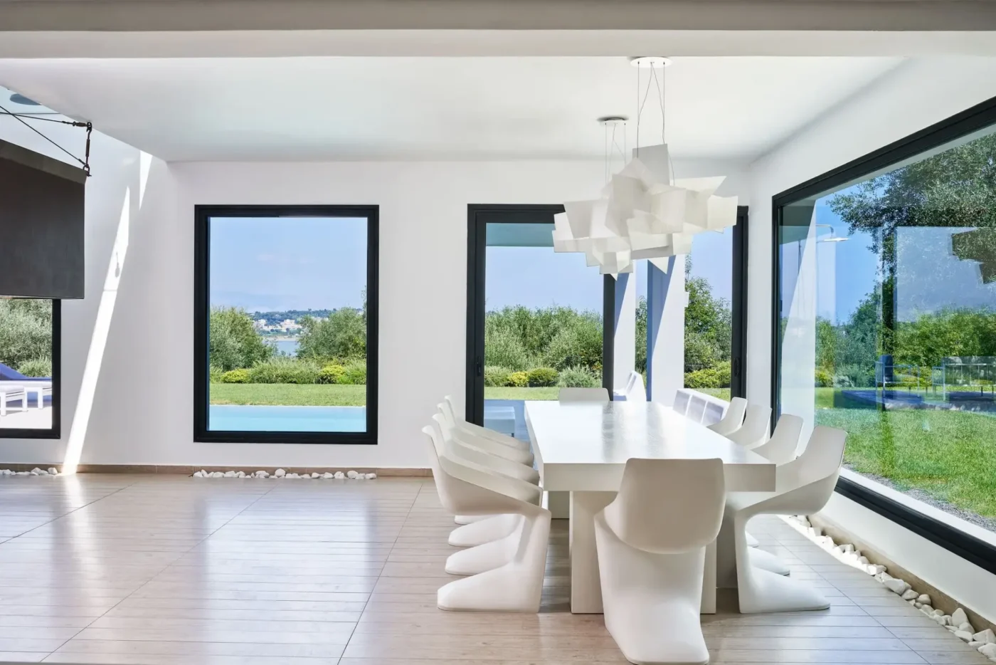 Alpha Homes Corfu Real Estate Viros Villa white dining table with chairs